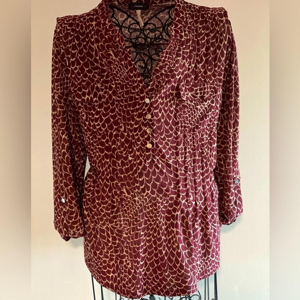 Burgundy and off white blouse.